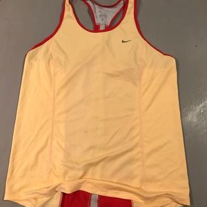 Orange, red, and gray nike workout top